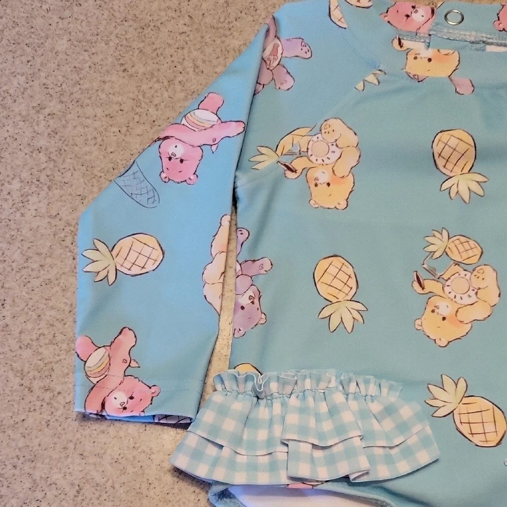 Care BearsOne Piece Swim Rashguard SIZE 3-6 months Nwt